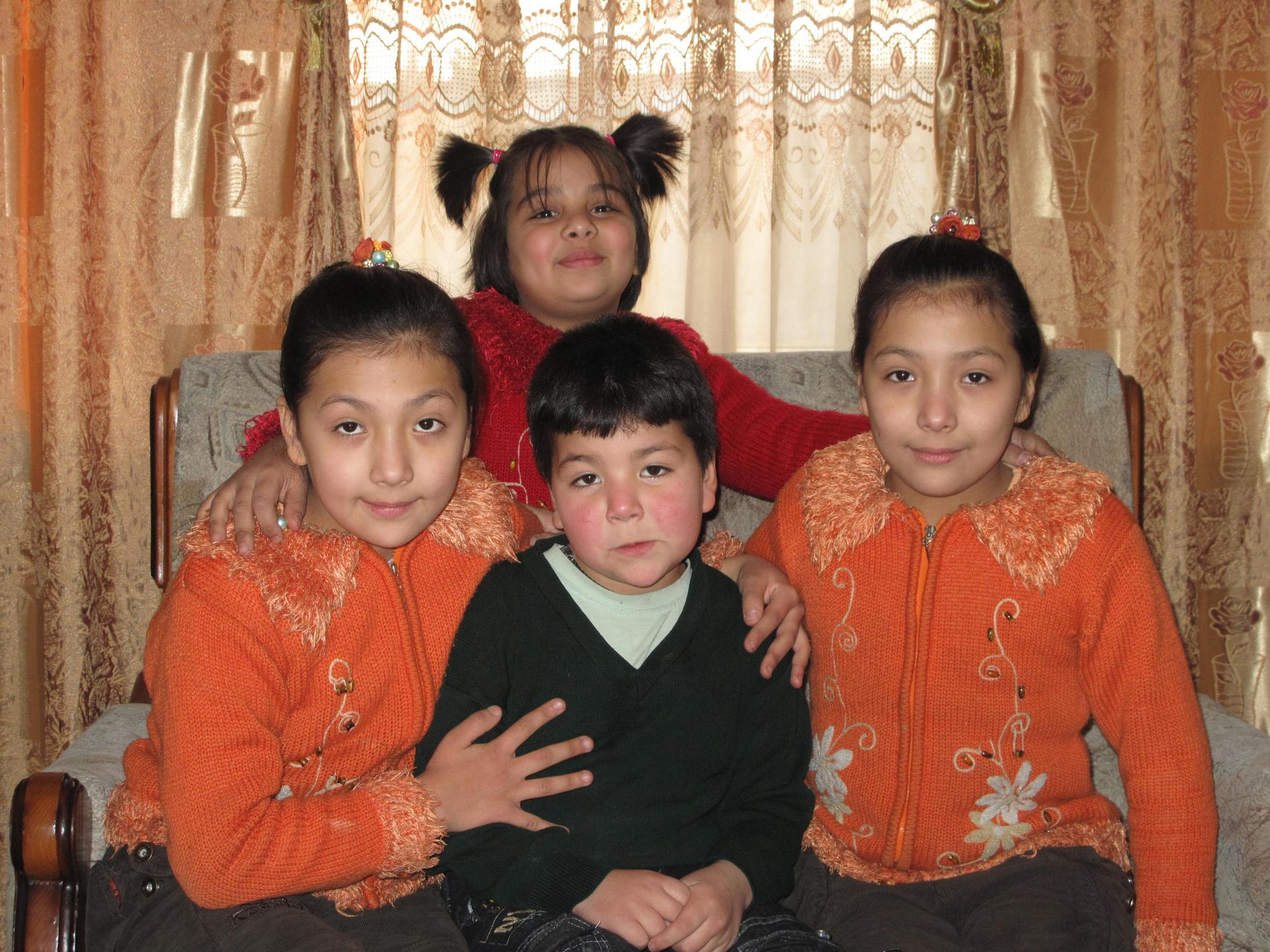 Mehran, a bacha posh featured in the book poses with her sisters