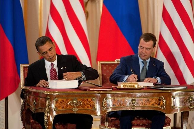 US President Barack Obama and Russian President Dmitry Medvedev sign the New START Treaty during a ceremony in Prague, Czech Republic, on April 8, 2010.