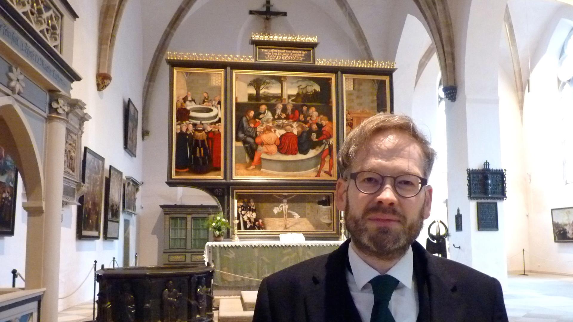Pastor Johannes Block preaches in Town Church, where Martin Luther preached nearly 500 years ago.