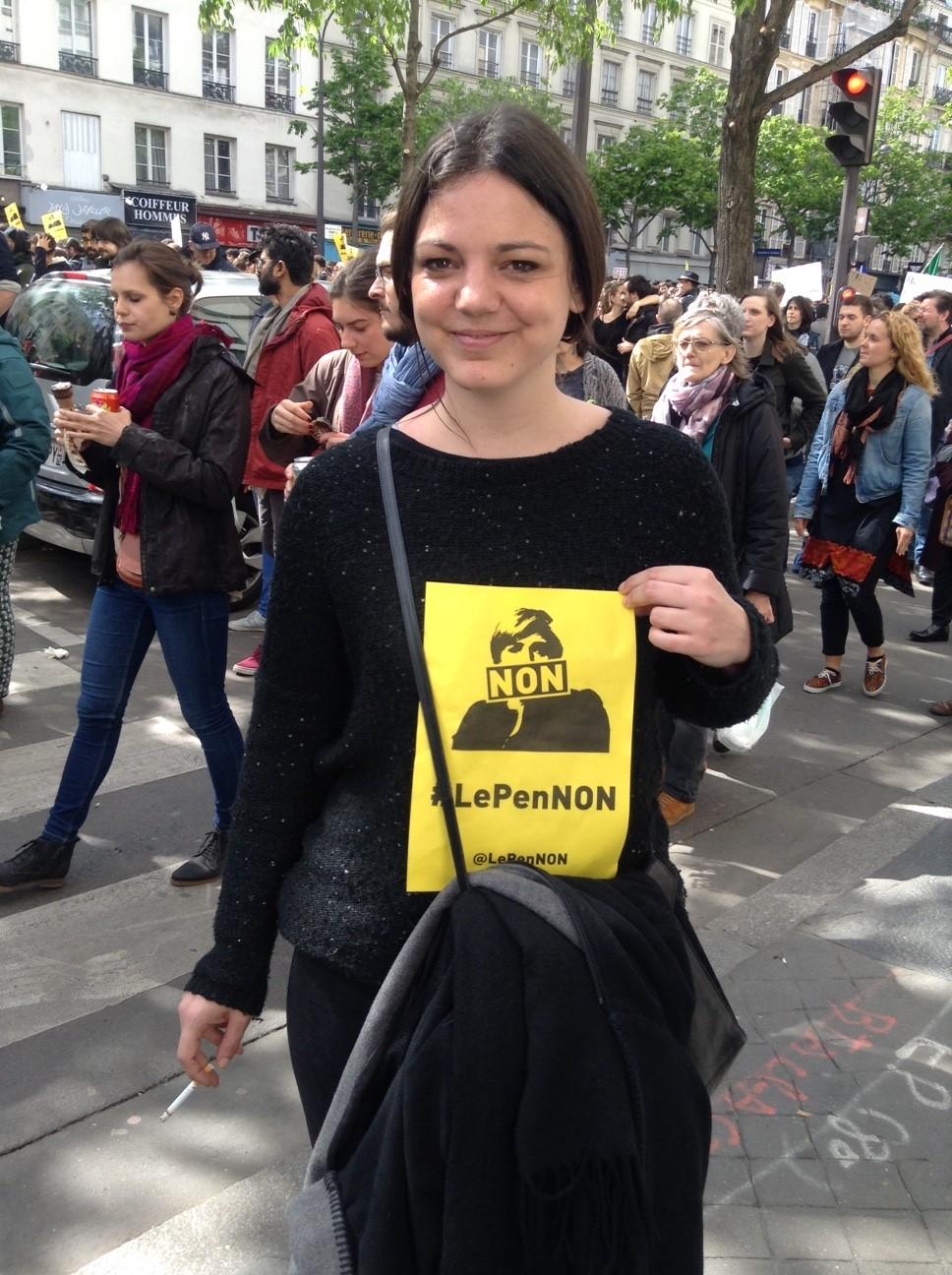 A young woman at a May 1st anti Marine  Le Pen rally in Paris.