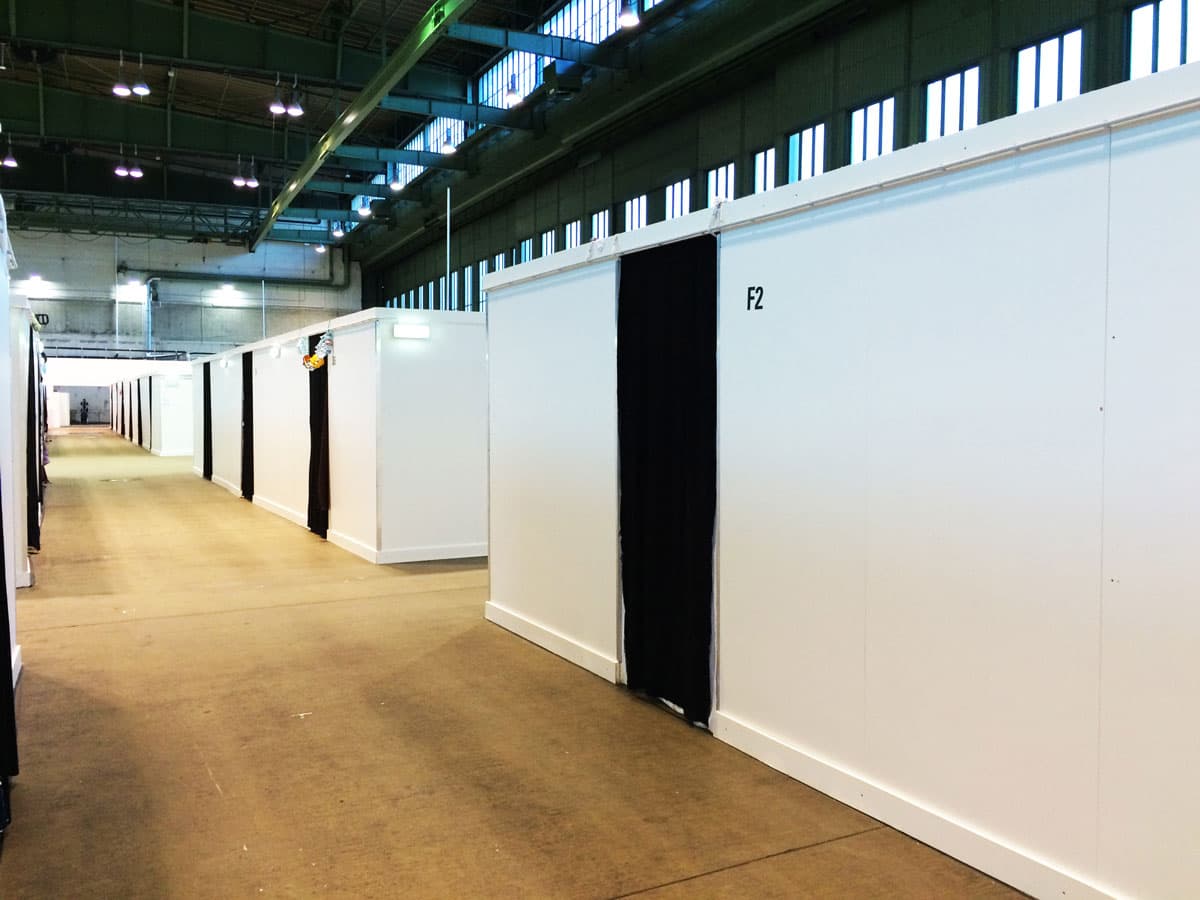 More than 1,200 refugees live inside Berlin’s former Tempelhof airport hangars.