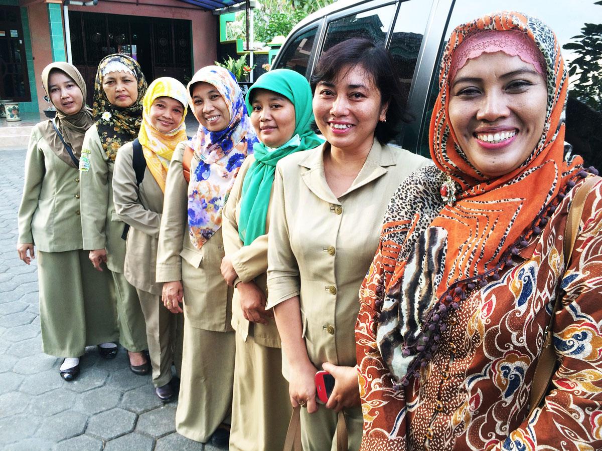 These midwives in Wonosari, in central Indonesia, are the local eyes and ears on the ground. They keep track of how women are doing during and after pregnancy, and offer family planning services.