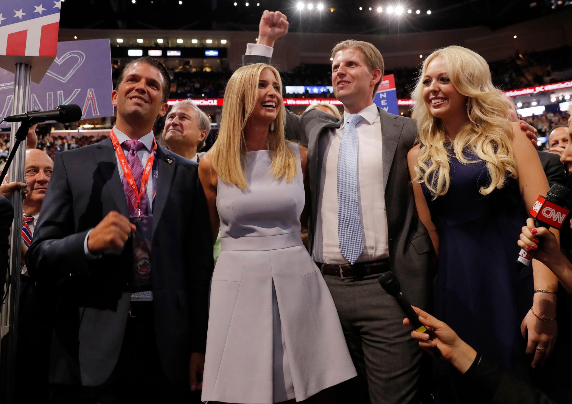 Donald Trump's children (L-R): Donald Trump Jr., Ivanka Trump, Eric Trump and Tiffany Trump, celebrate after announcing the votes of the New York delegation to put their father over the top to win the Republican presidential nomination.