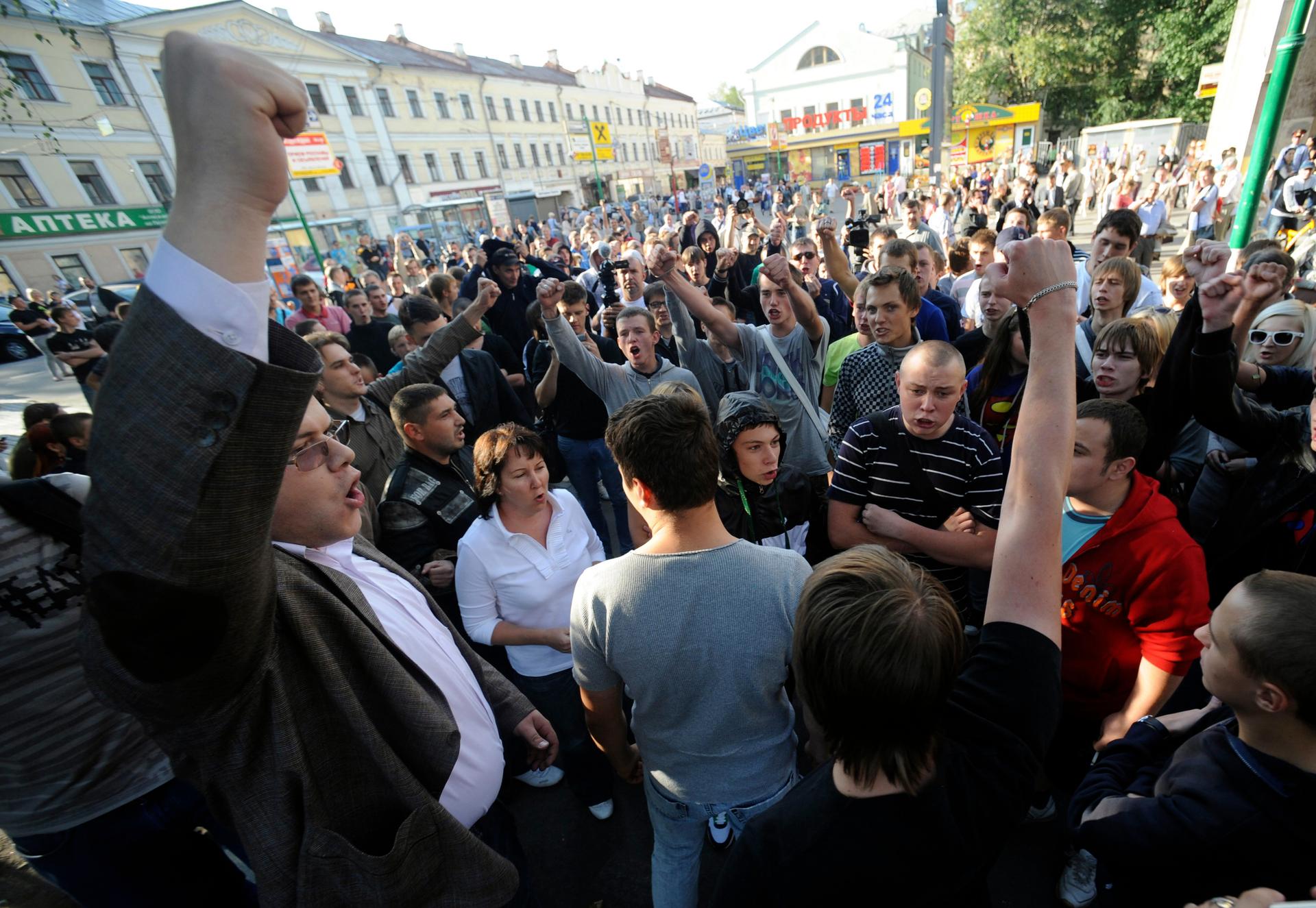 Demonstrators shout slogans during a protest against Dagestani-born martial arts champion Rasul Mirzayev in central Moscow August 25, 2011. Mirzayev has been detained and accused of killing a Muscovite during a street fight.