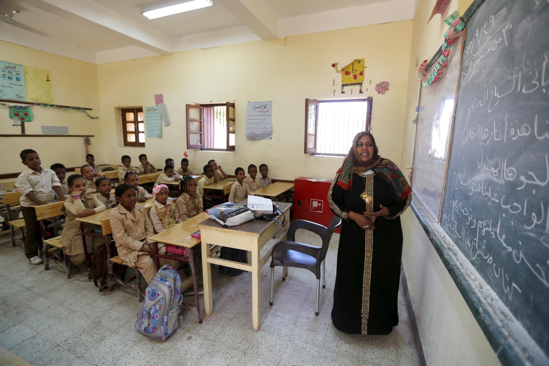 A teacher conducts a lesson at a school in the Nubian village of Adindan.