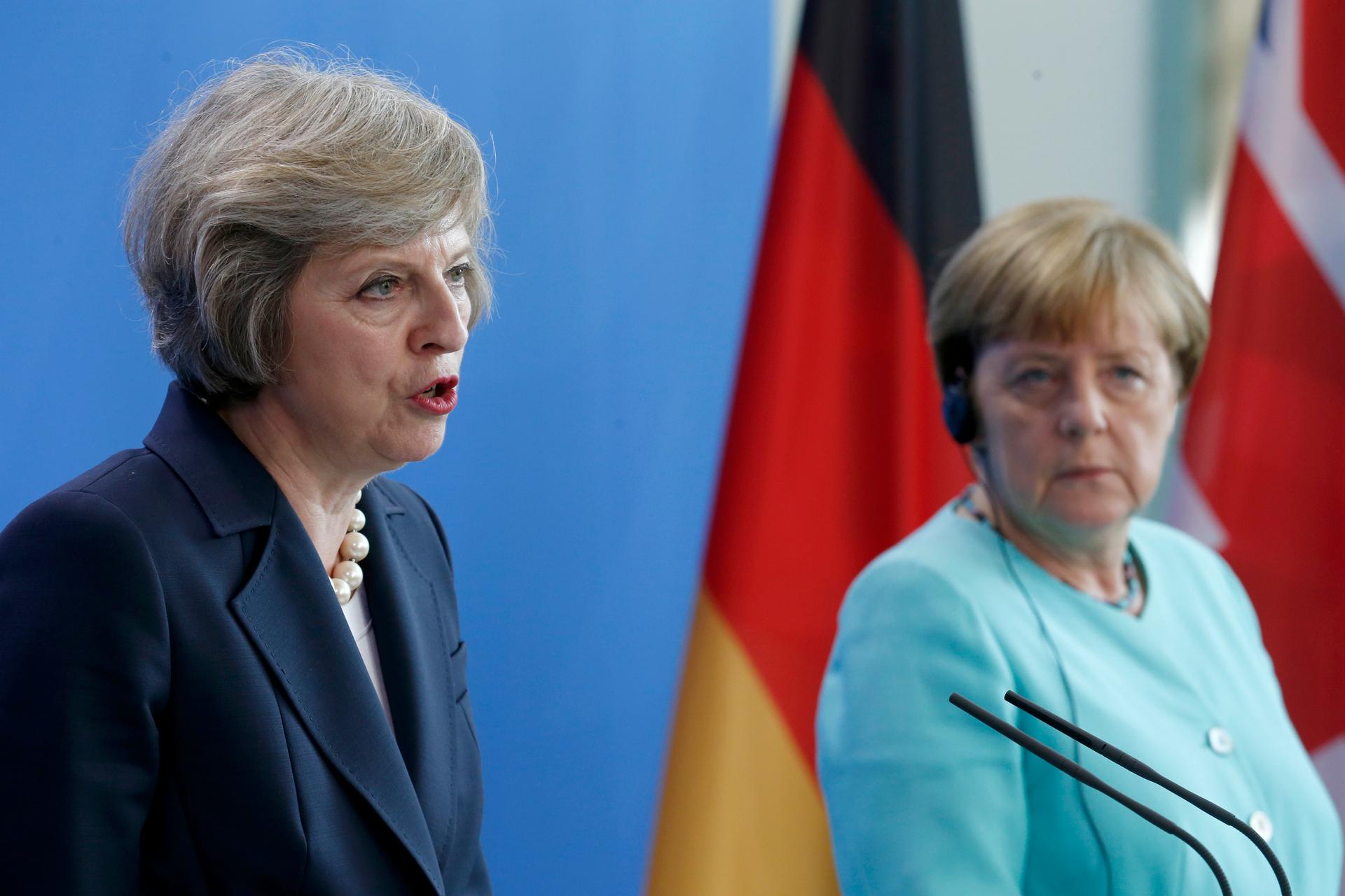 German Chancellor Angela Merkel and British Prime Minister Theresa May address a news conference following talks at the Chancellery in Berlin, Germany July 20, 2016.