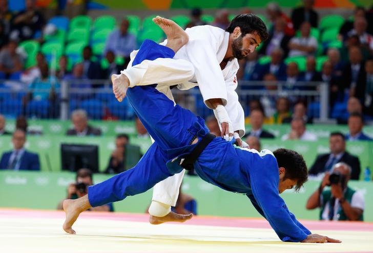 ​2016 Rio Olympics - Judo - Final - Men -60 kg Final - Gold Medal Contest - Carioca Arena 2 - Rio de Janeiro, Brazil - 06/08/2016. Beslan Mudranov (RUS) of Russia and Yeldos Smetov (KAZ) of Kazakhstan compete.