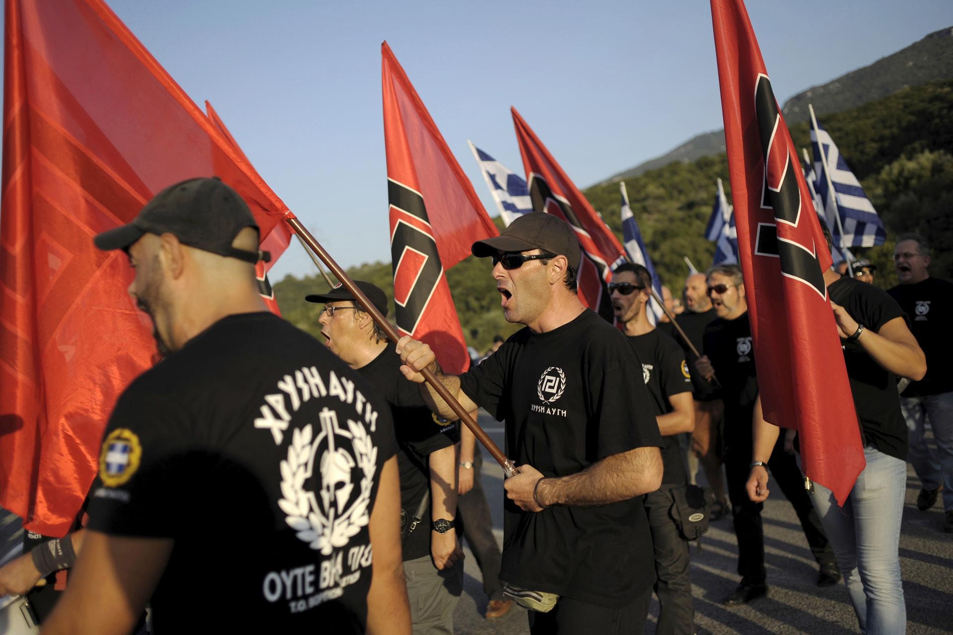 Golden Dawn supporters prepare for a rally in Thermopylae, outside Athens, Greece, Sept. 5, 2015.