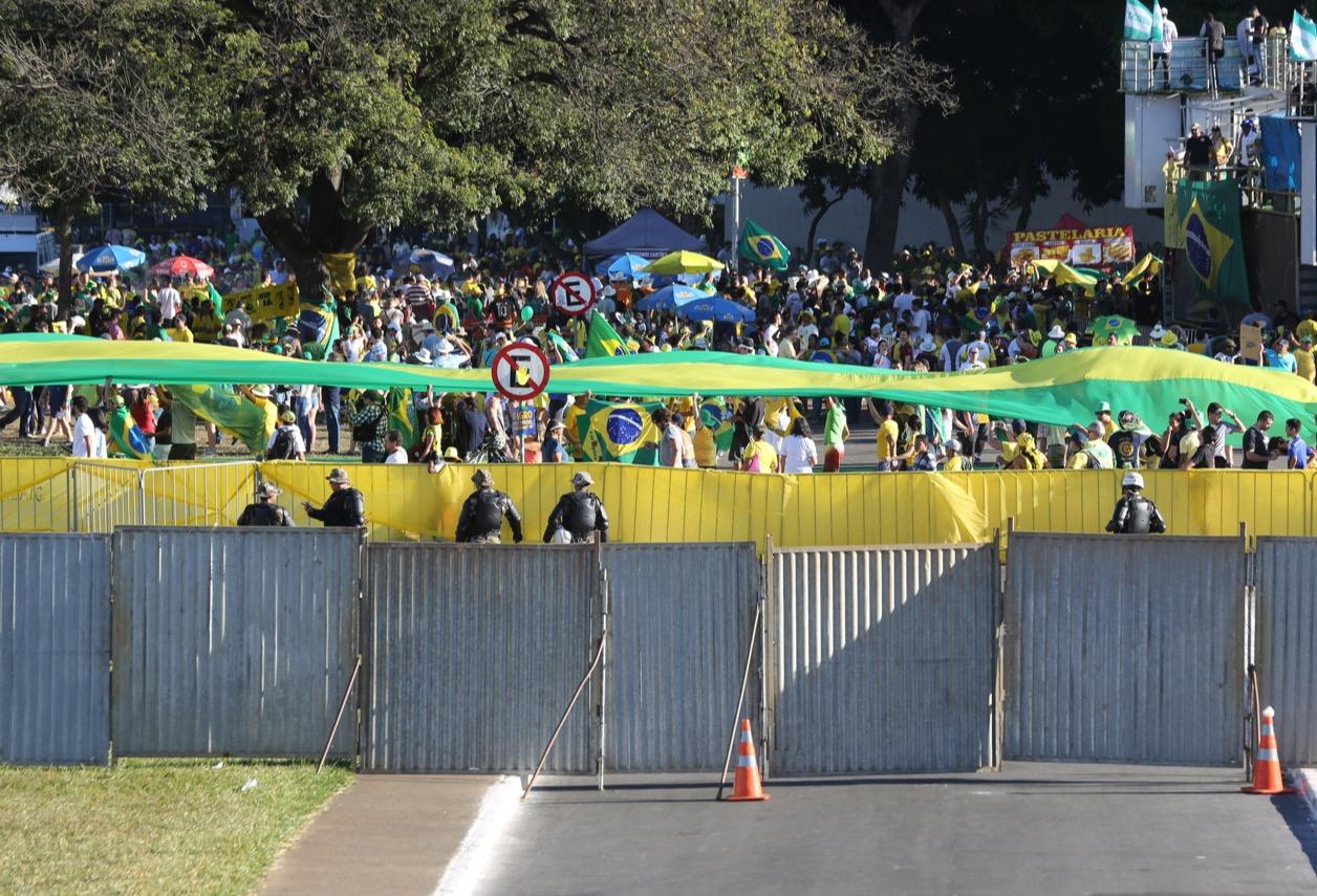 Authorities erected a fence to separate demonstrators for and against Rousseff's impeachment in Brasilia.