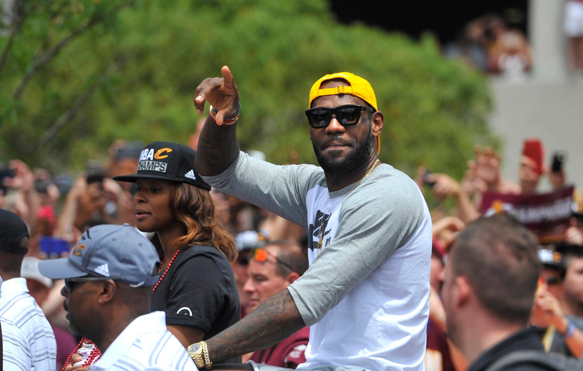 Cleveland Cavaliers forward LeBron James celebrates during the NBA championship parade in downtown Cleveland.