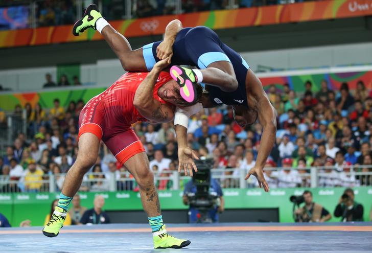 Wrestlers Frank Molinaro (USA) of USA and Frank Chamizo Marquez (ITA) of Italy compete at the 2016 Rio Olympics, Rio de Janeiro, Brazil.