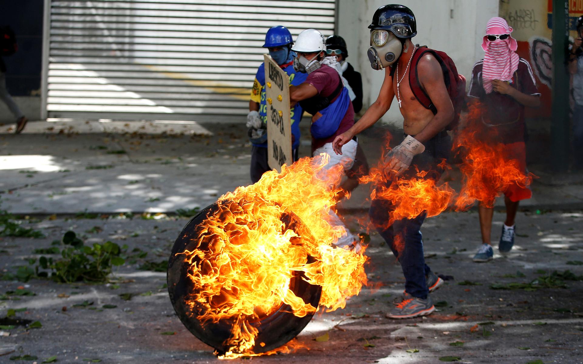 Demonstrators rally during a strike called to protest against Venezuelan President Nicolás Maduro's government in Caracas, Venezuela, July 26, 2017.