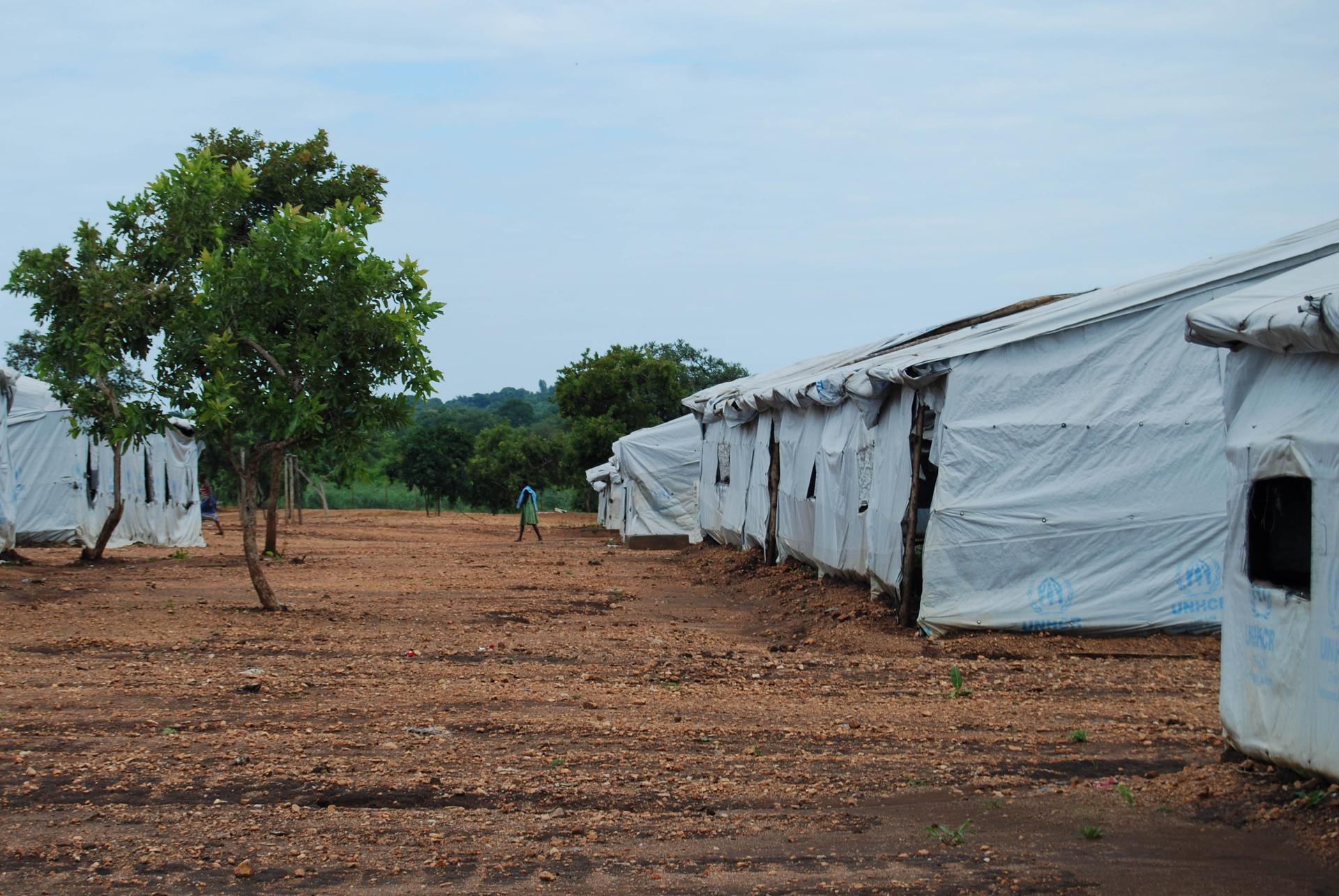 A refugee walks through the central reception area of the Bidi Bidi settlement. New arrivals are sent to other camps in Uganda, so this area is now largely deserted.