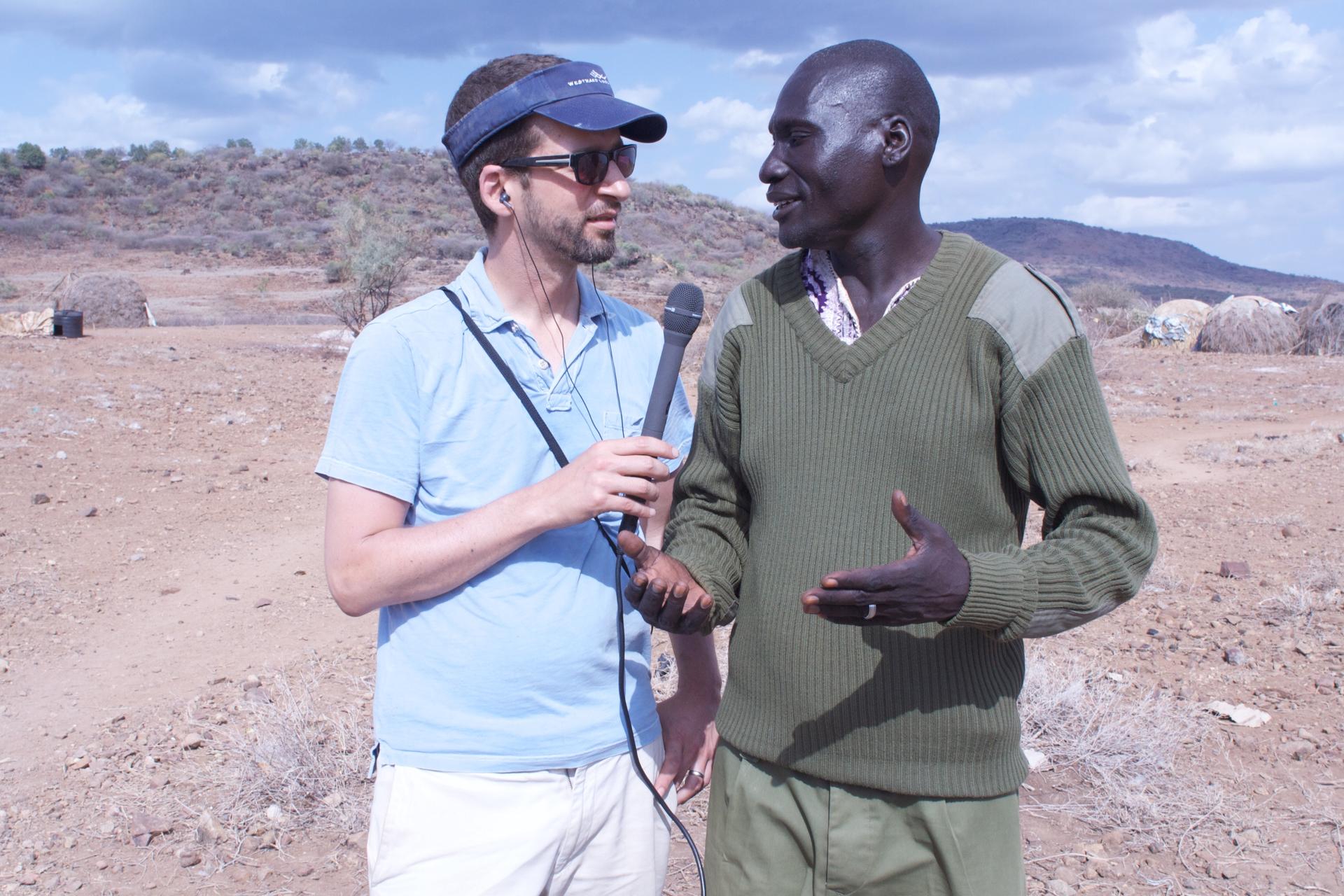 Reporter Michael May interviews Turkana Chief James Ereng