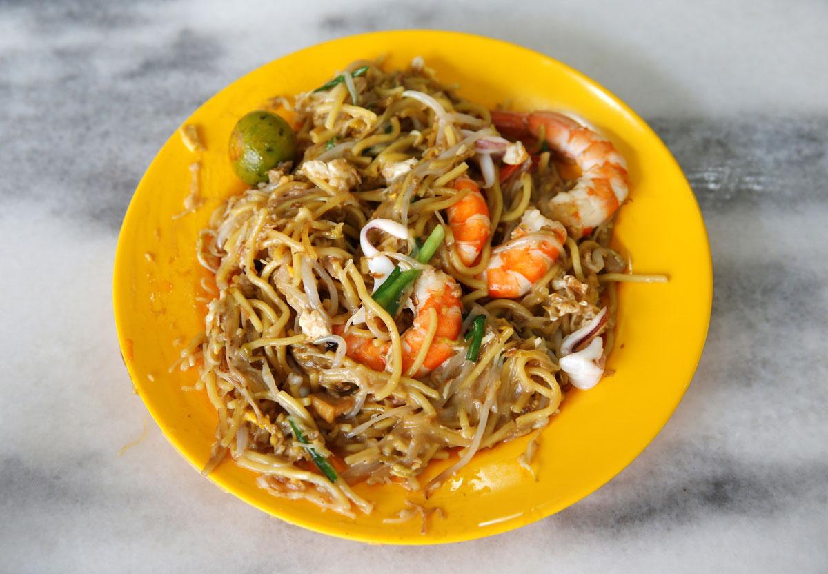 A plate of $3.70 hokkien mee (prawn noodles) is seen at Geylang Lorong 29 Fried Hokkien Mee.