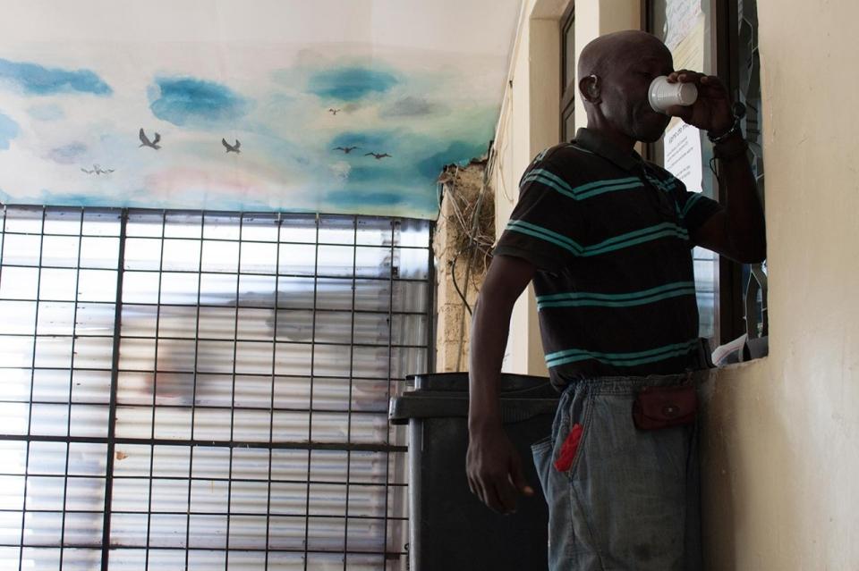 A man takes methadone at the Muhimbili National Hospital's methadone clinic in Dar es Salaam, Tanzania.