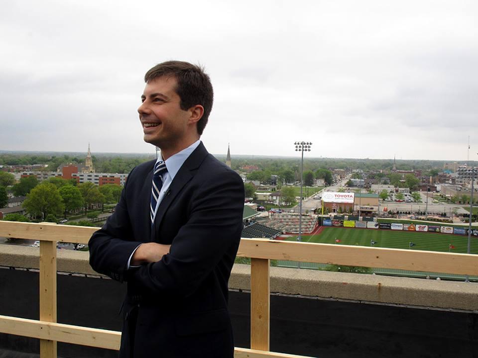 South Bend Mayor Pete Buttigieg stands on the roof deck of the old Studebaker factory, now being called the “Renaissance District.”