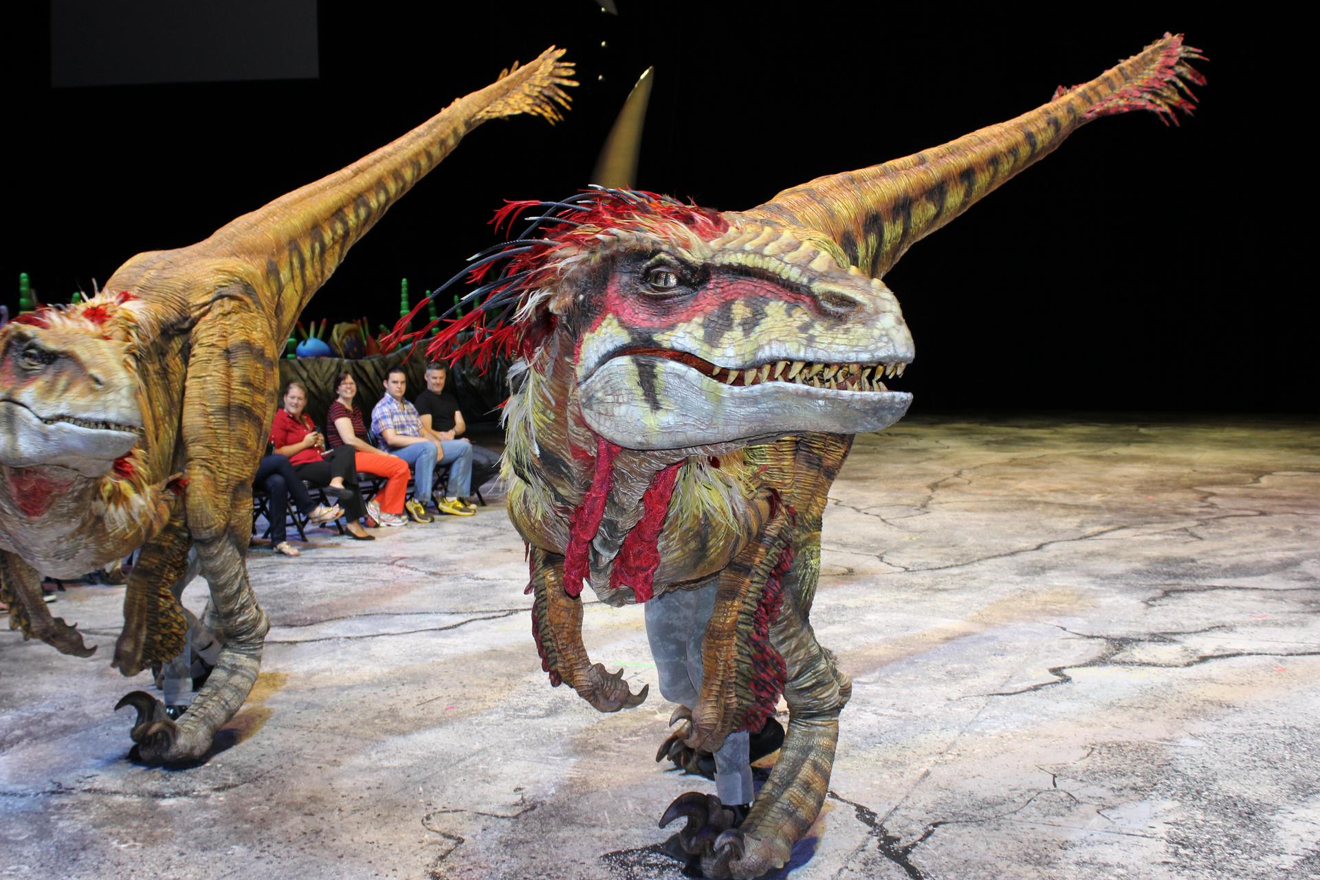 A Utahraptor puppet at a performance of 