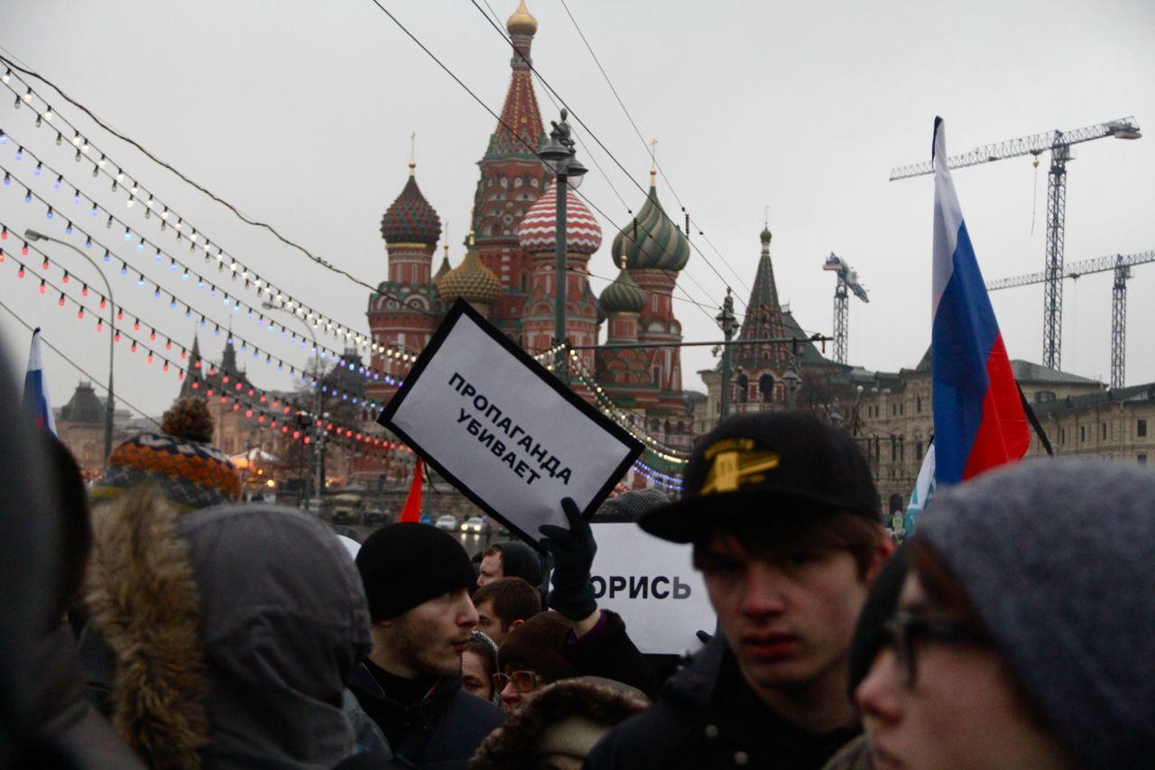 A sign at a march in memory of Russian opposition leader Boris Nemtsov reads: 