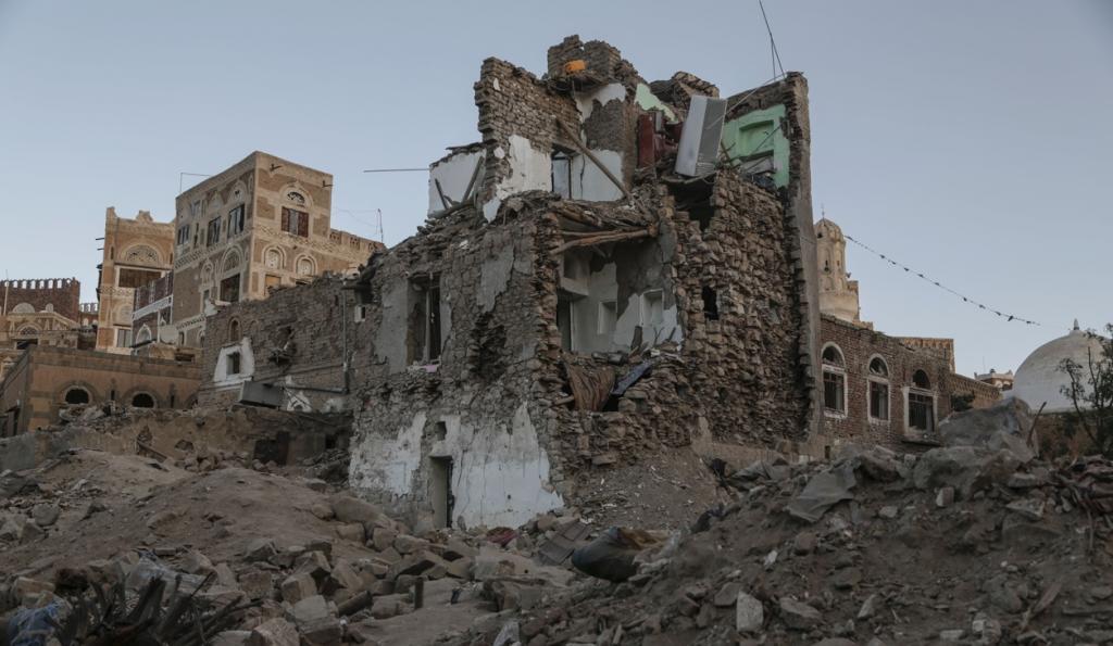 An airstrike destroyed the home of Hafzallah al-Ayani, a vegetable merchant, in the UNESCO world heritage site of the Old City of Sanaa. An estimated 130 houses surrounding the area were damaged. The entire al-Anyi family was killed as they sat down to di