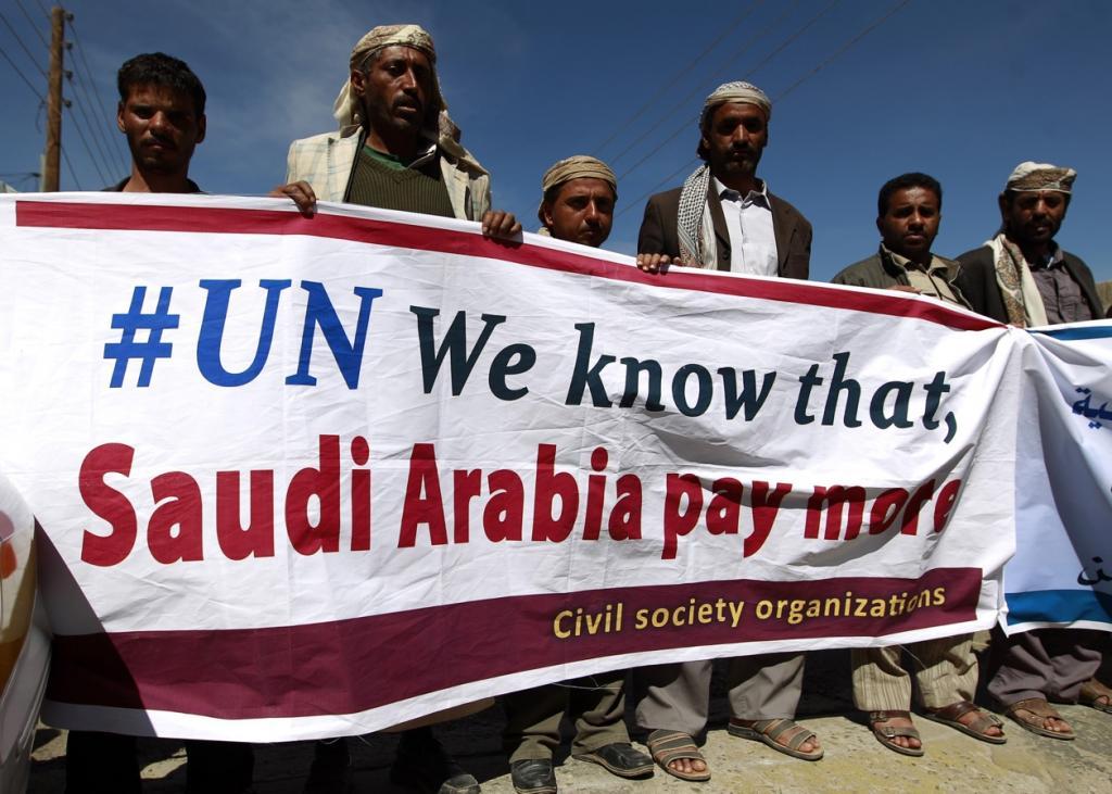 Yemeni men protest outside the UN office in Sanaa on Nov. 2, 2015.