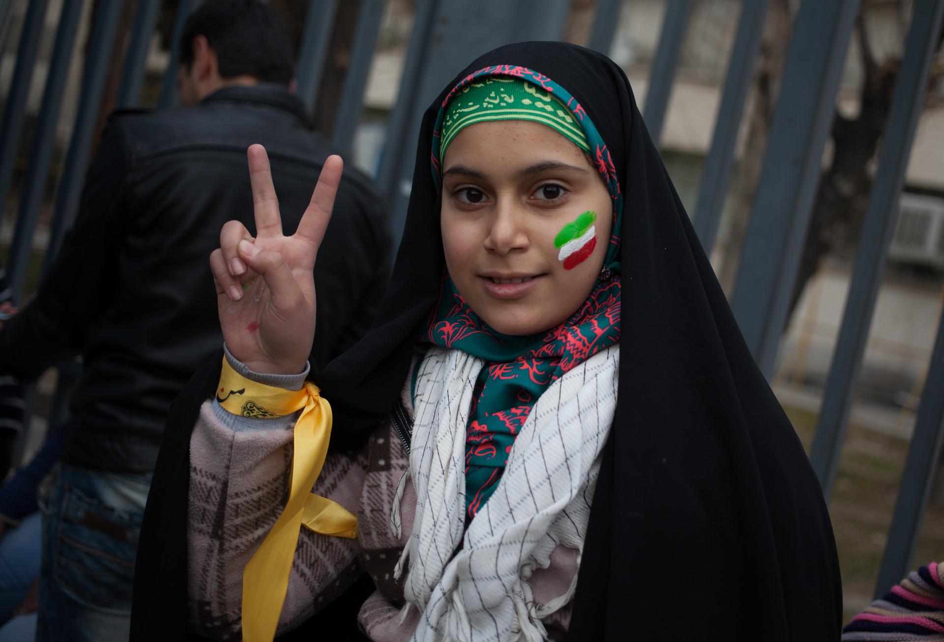 Young Iranian attending the rally in Tehran.