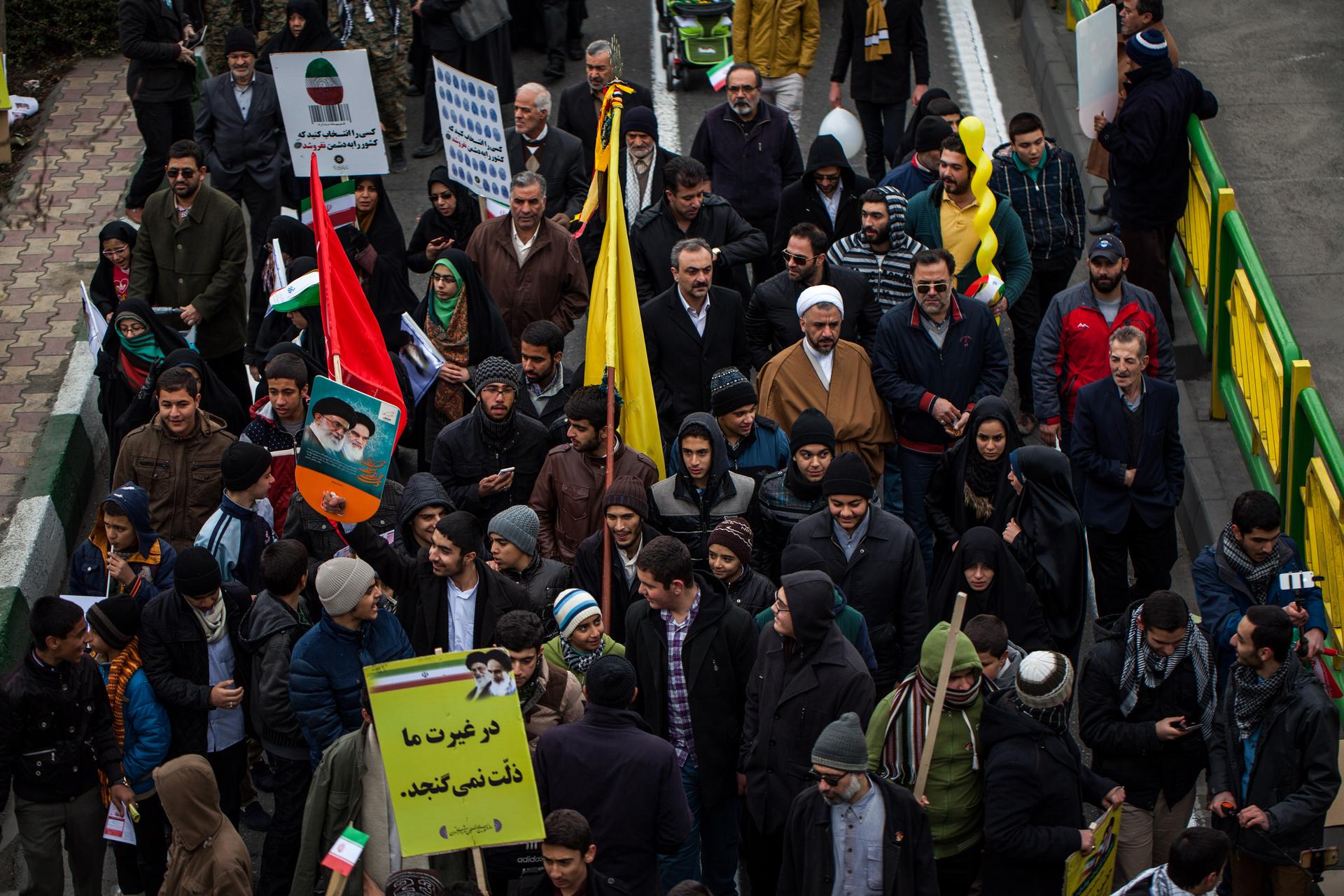 Iranians attend rally in Tehran.