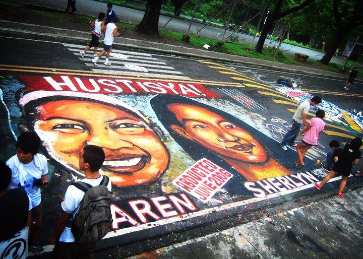 A street inside a university was painted with the faces of two student leaders abducted in 2006 by suspected military agents.