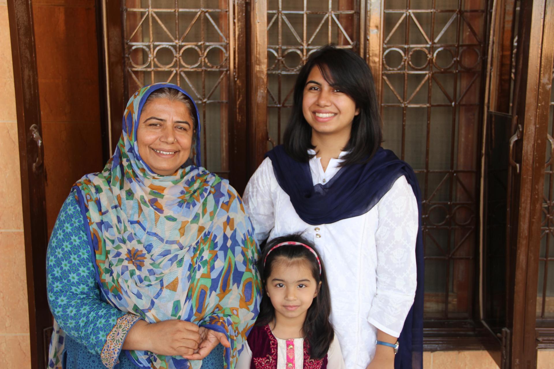 Shafqat Munir stands with her daughter, Um-E Salma, and her granddaughter, Umaima Awan