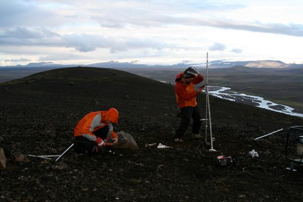 Scientists setting up GPS sensors to measure "accelerated uplift" in Iceland.