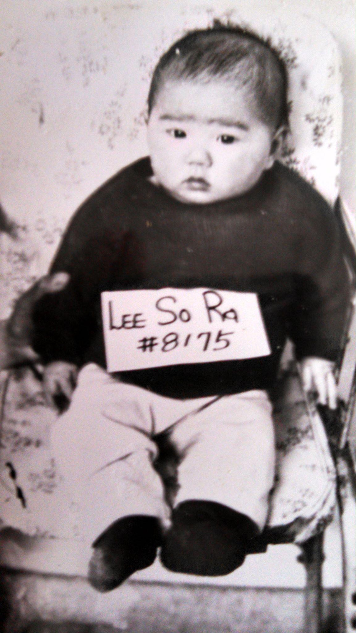 My adoption photo in Korea, with my adoption number #8175.