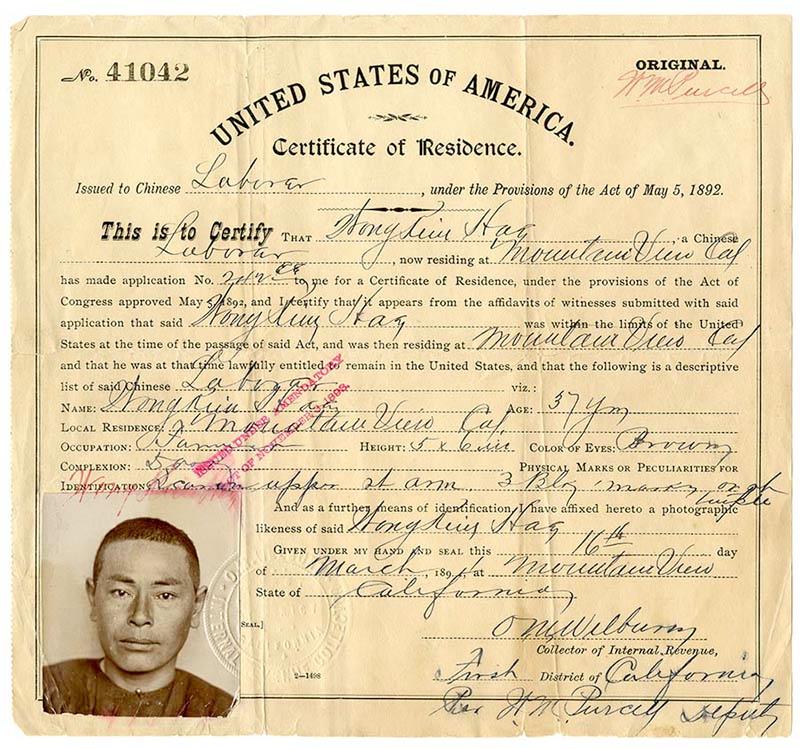 Printed on yellow paper and with a photograph in the lower lefthand corner, a certificate of residency includes biographical, residential, and employment information of a Chinese laborer living in California in the early 1890s