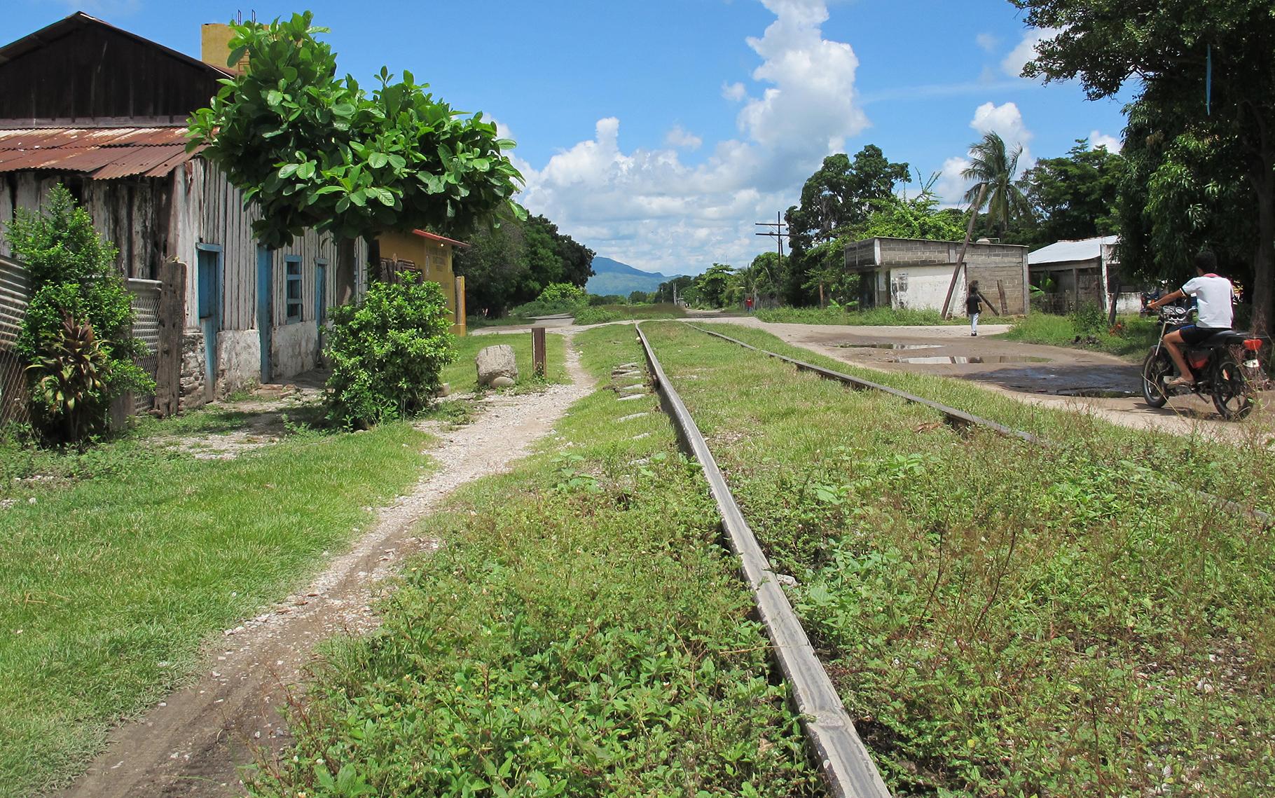 Railroad tracks in Chahuites. Some migrants spend weeks walking along train tracks in southern Mexico where they face high risks of robbery, kidnapping and sexual assault.