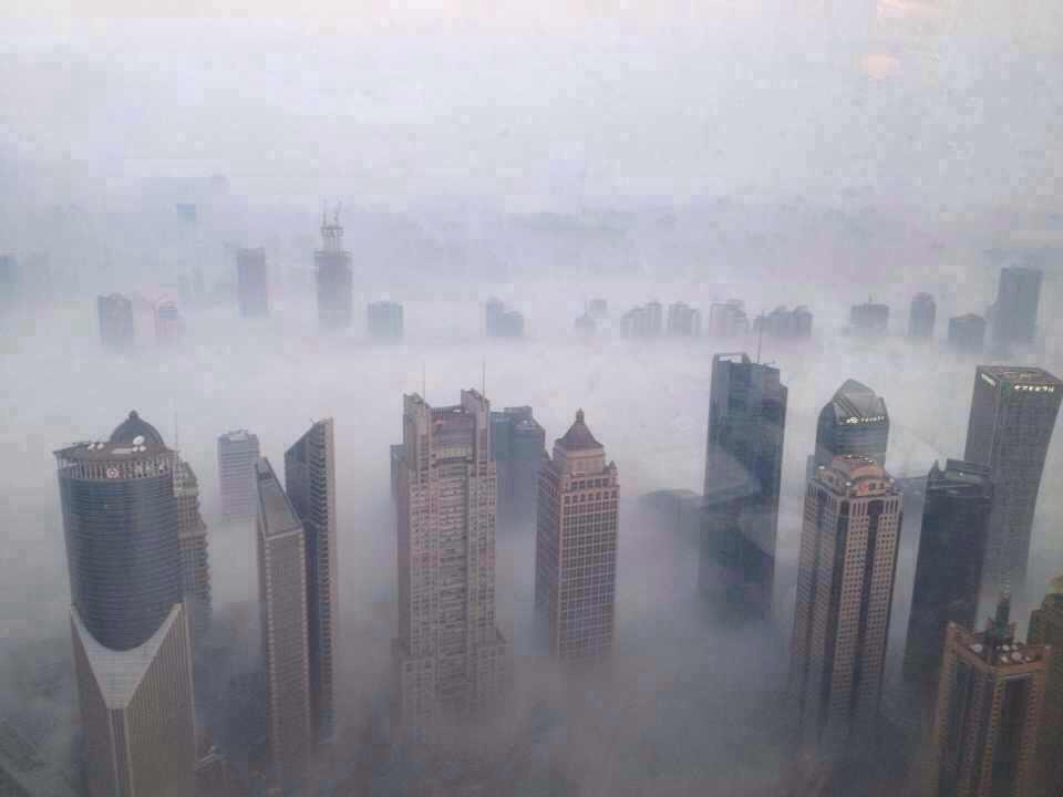 Smog chokes downtown Shanghai on a daily basis. China has recently started a carbon market initiative to reduce its emissions by charging for what is deemed as excessive based on governmental guidelines.