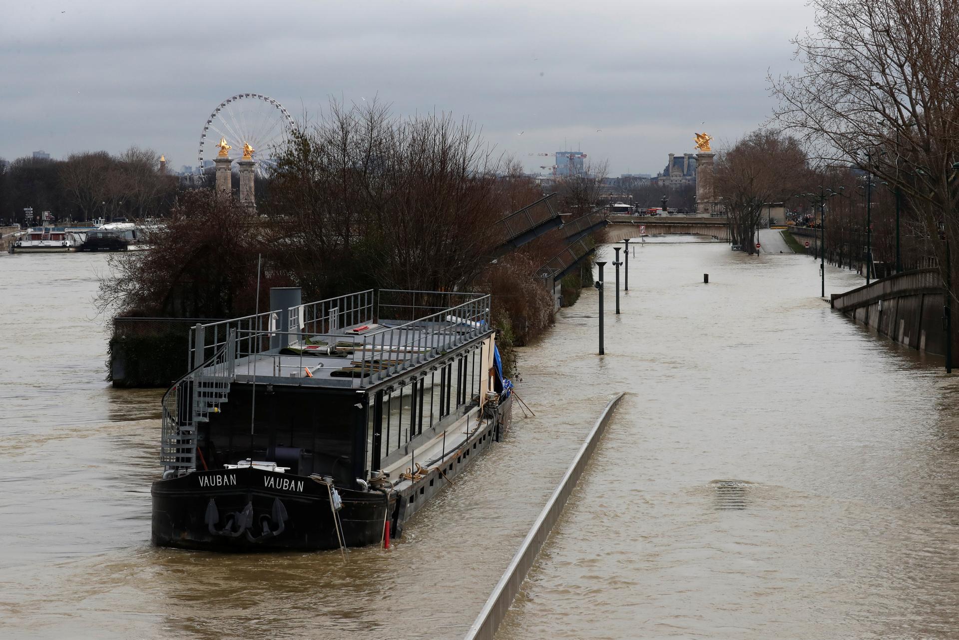 A view shows a peniche boat moored along the flooded banks of the River Seine after days of almost non-stop rain caused flooding in the country in Paris, France.