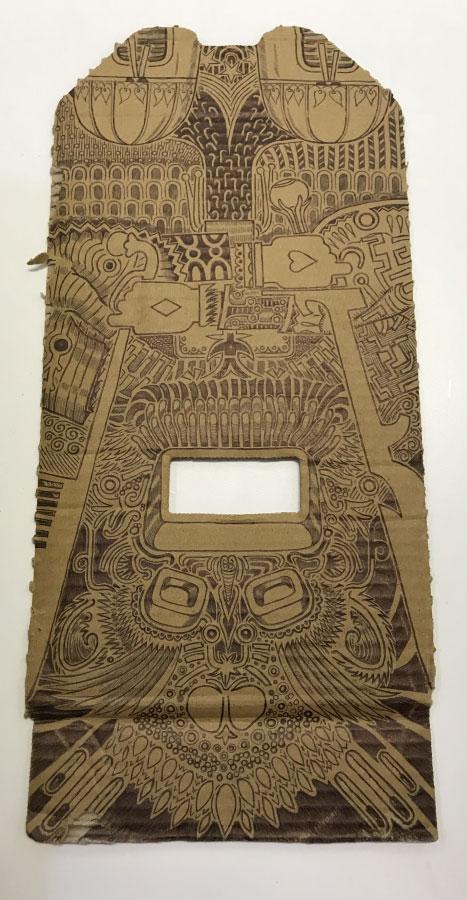 A piece of cardboard is decorated with pen, the work of a cartoonist while imprisoned