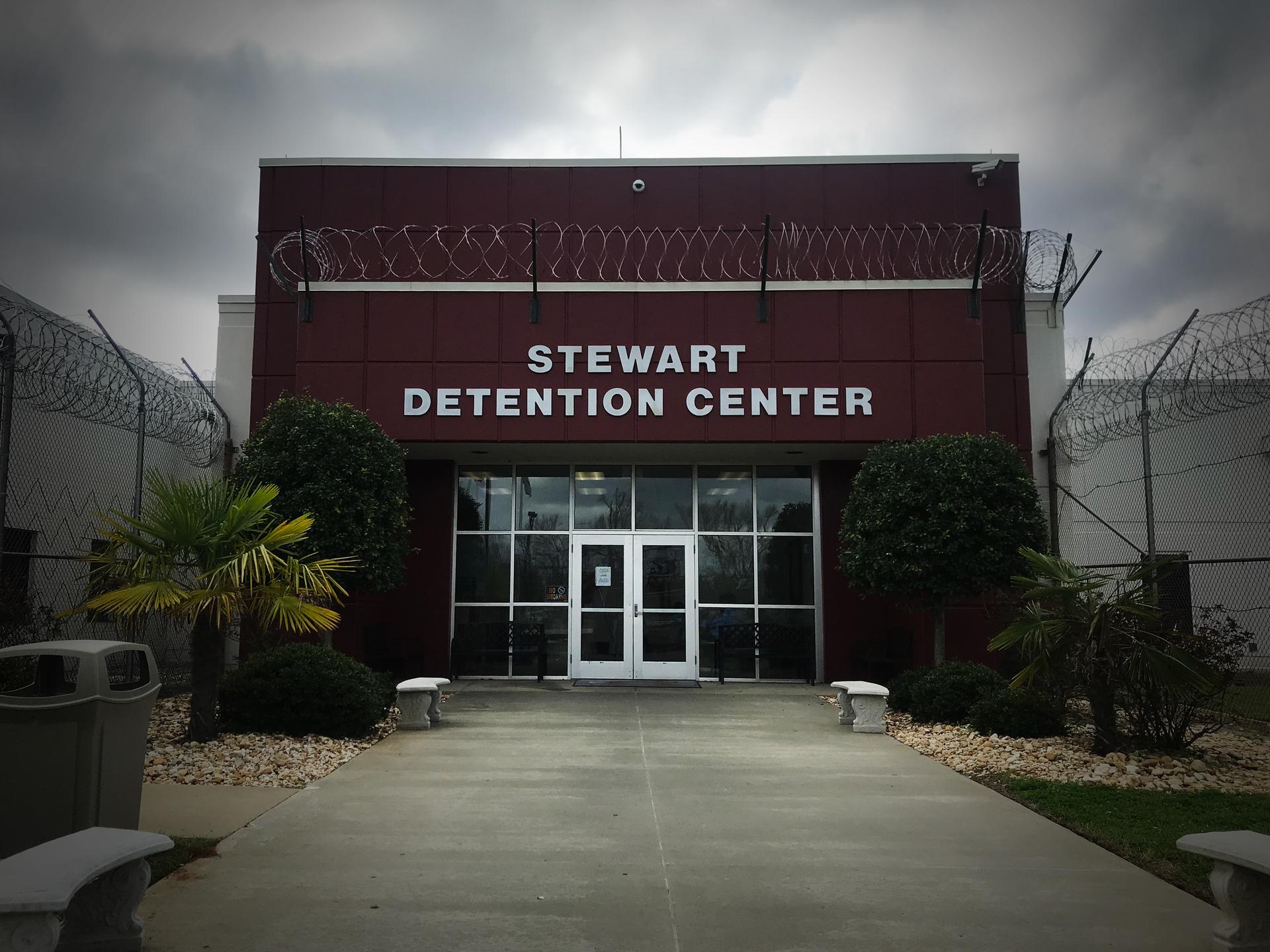 the outside of Stewart Detention Center in the pine woods of southwest Georgia.