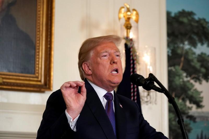 President Donald Trump makes a statement about Syria at the White House in Washington, April 13, 2018.