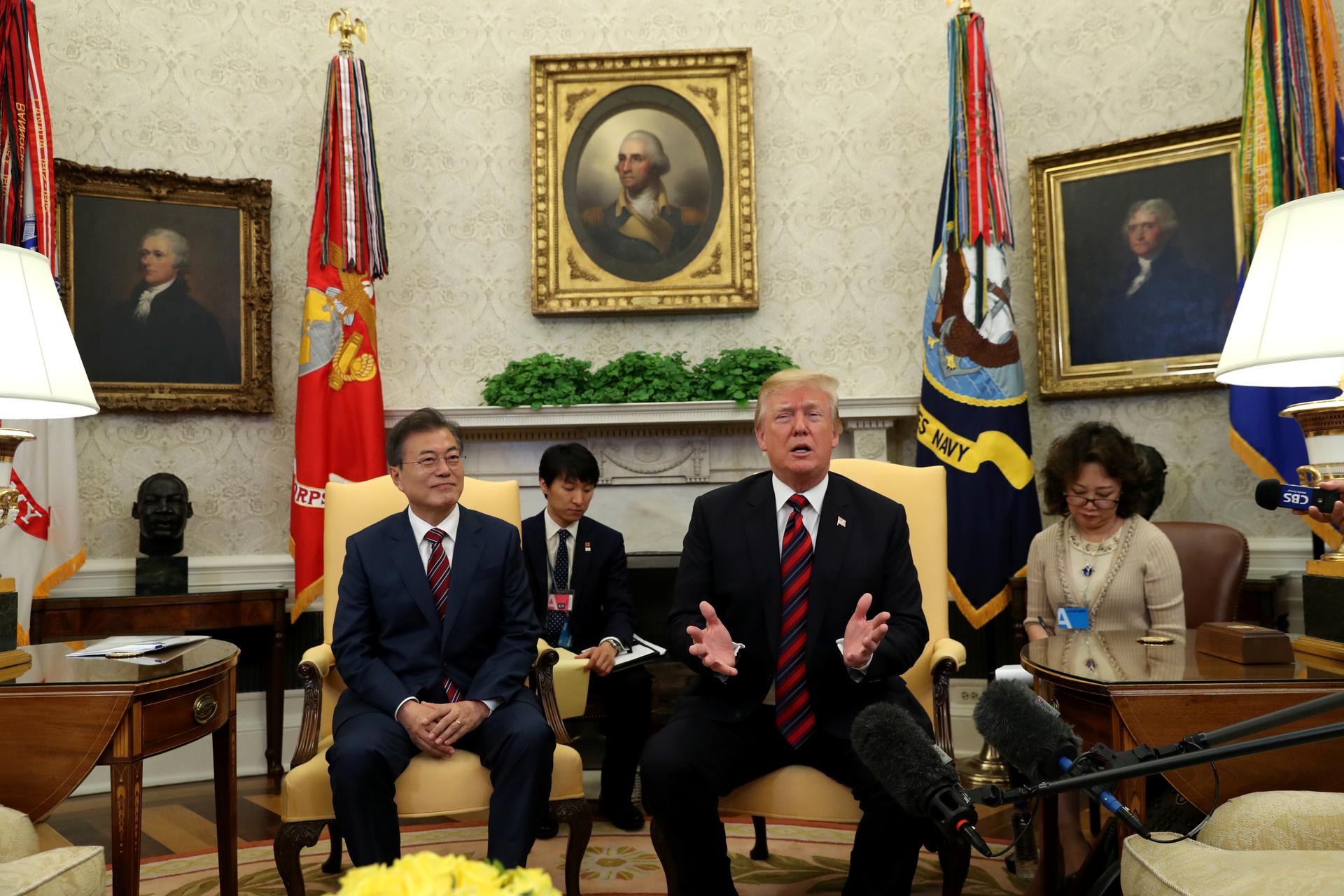 US President Donald Trump sits beside South Korea's President Moon Jae-In in the Oval Office of the White House in Washington, DC, May 22, 2018. 