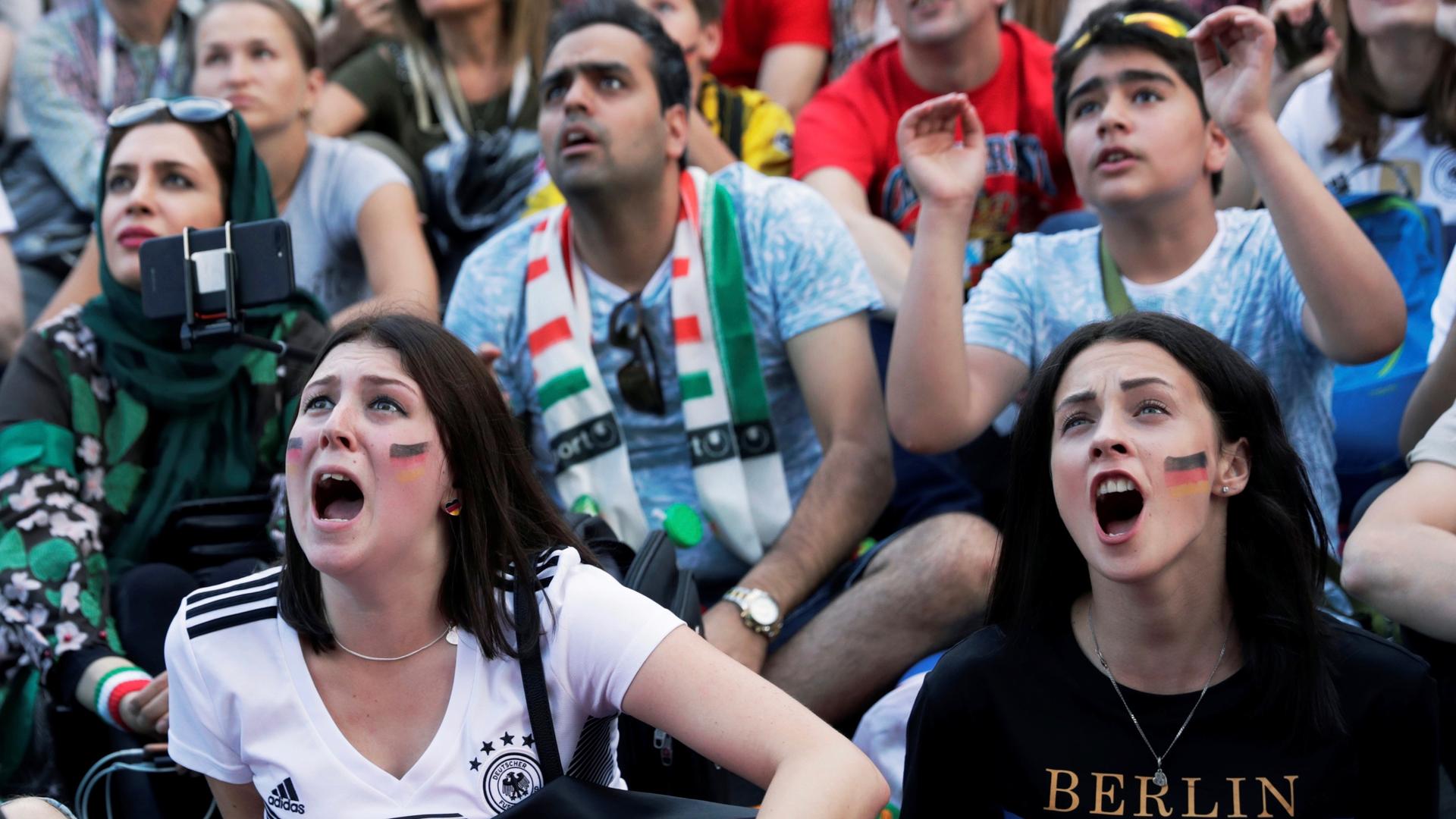 Fans watching the Germany-Mexico FIFA World Cup game at a fan fest in Saint Petersburg, Russia on June 17, 2018. 