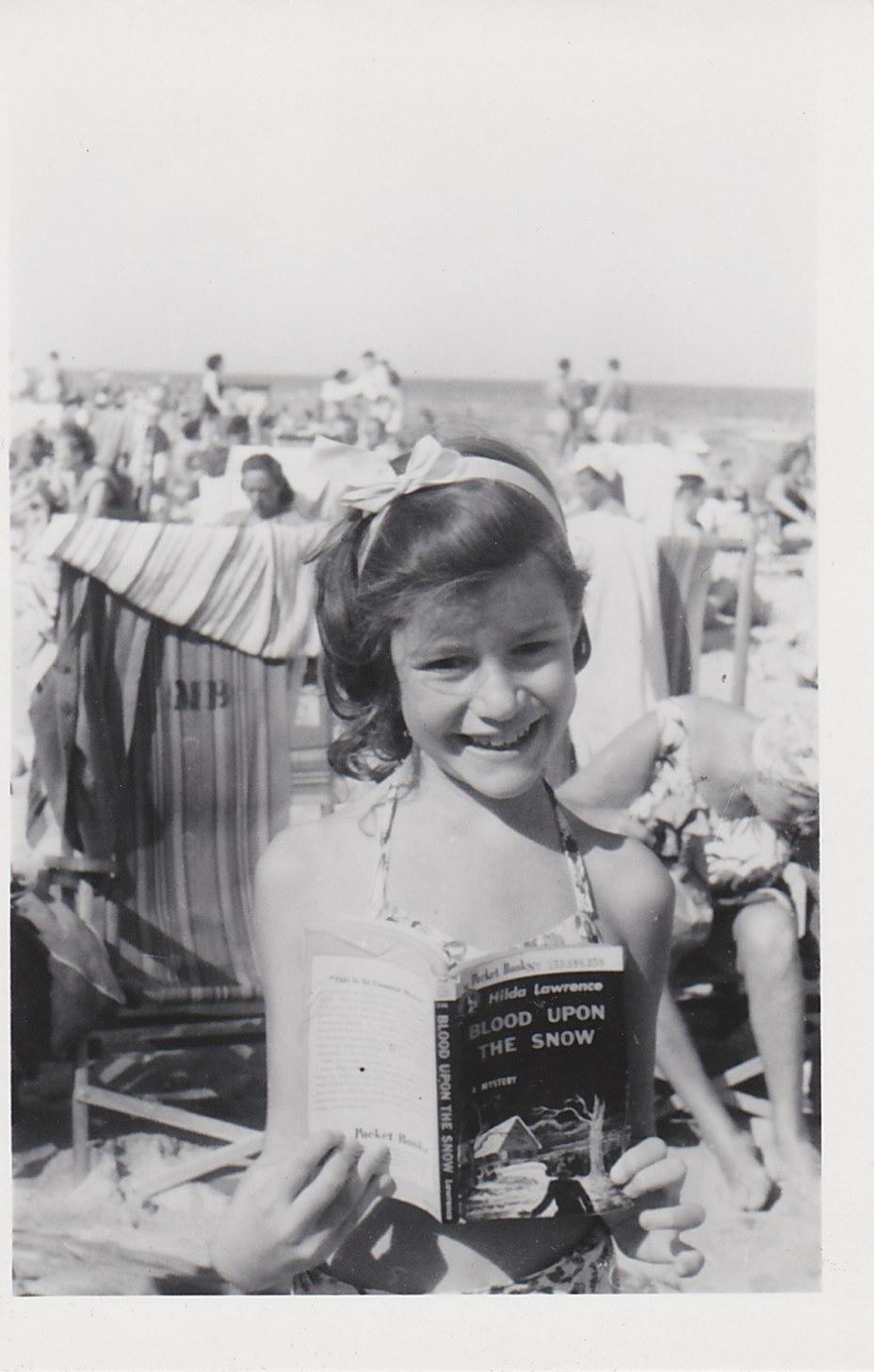 Judy doing some beach reading on Miami Beach.