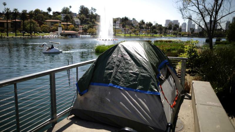 A tent is seen next to Echo Park Lake in Los Angeles, California, April 11, 2018.