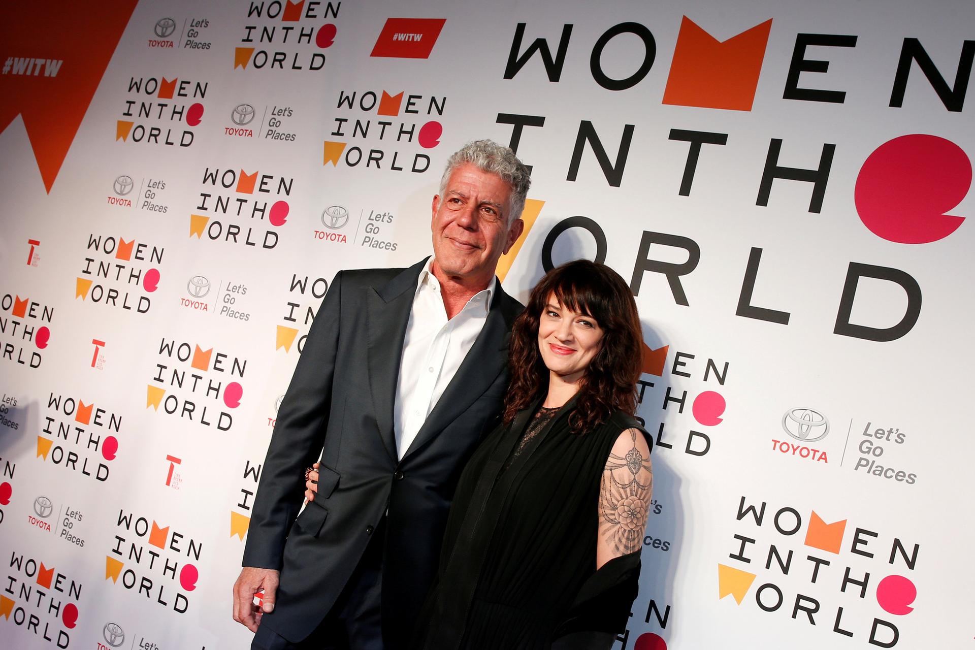Anthony Bourdain poses with Italian actor and director Asia Argento
