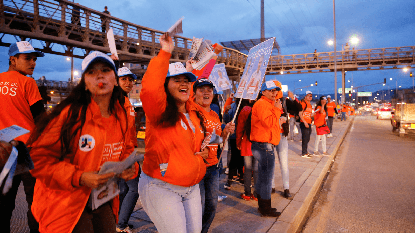 Supporters cheer with the leaflets and placards ahead of the second round of presidential election in Soacha, Colombia, June 11, 2018. 