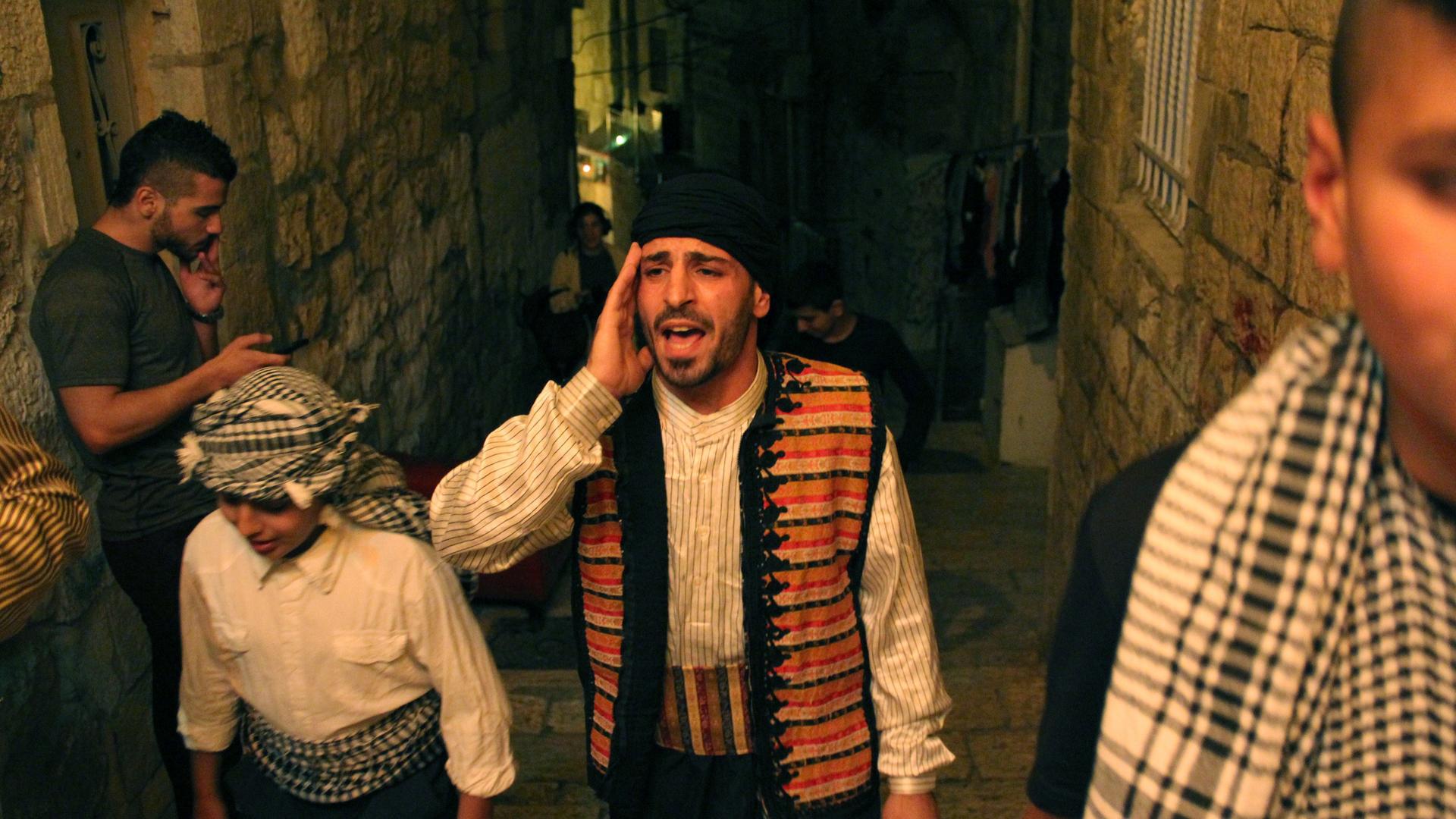 three young men in old city jerusalem 