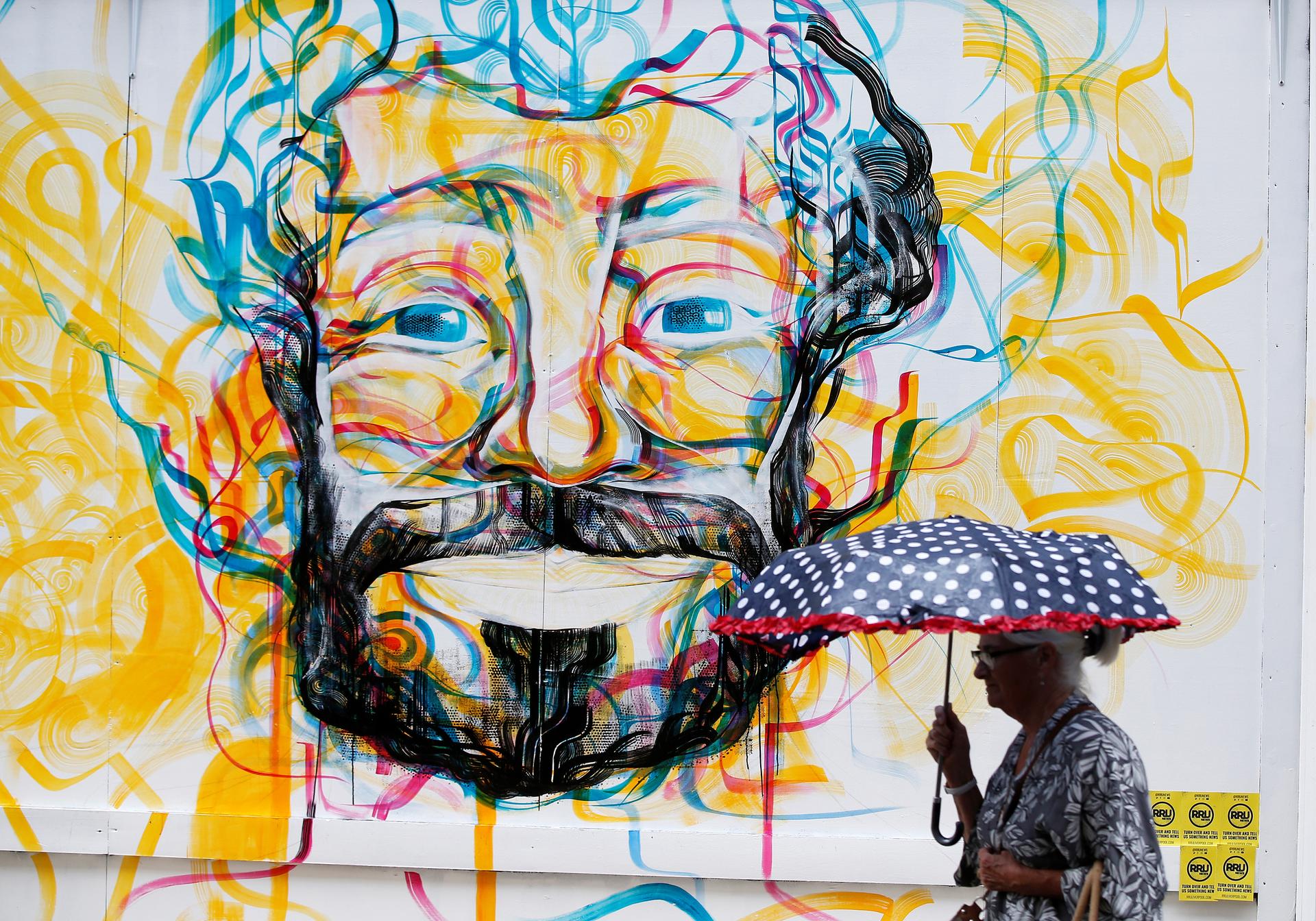 a colorful mural of a man's face