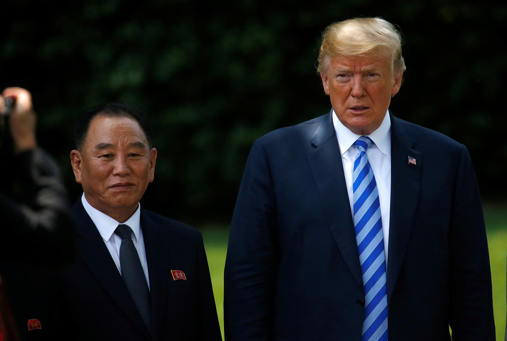North Korean envoy Kim Yong-chol, the country's former spy chief and current vice-chairman of the Central Committee of the Workers' Party of Korea, poses with President Donald Trump after a meeting at the White House in Washington, DC, June 1, 2018. Kim Y