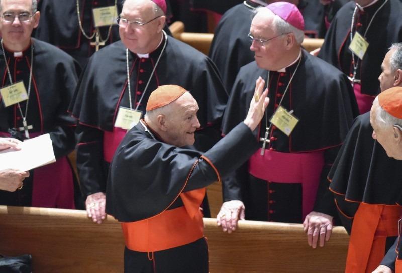 Cardinal Archbishop Emeritus Theodore McCarrick waves