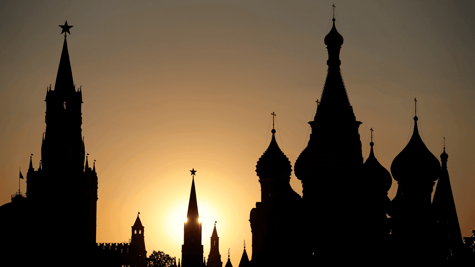 a profile view of the Kremlin in Moscow at sunset