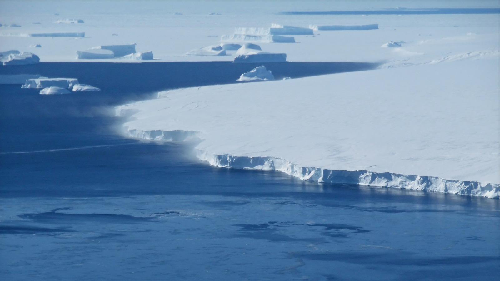 Snow is blown off of the calving front off of Thurston Island in western Antarctica in this photo, taken in November 2014. New findings show the western side of Antarctica to be more vulnerable to warming oceans — and increased ice loss — than first thoug